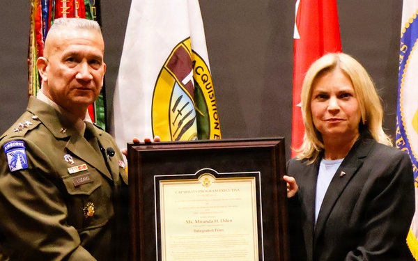 LTG Lozano presents certificate to Ms. Miranda H. Oden