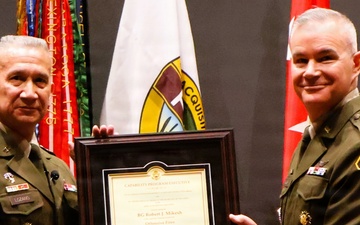 LTG Lozano presents certificate to Brig. Gen. G. Robert Mikesh