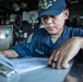 USS Mitscher (DDG 57) Sailor stands watch in ship bridge