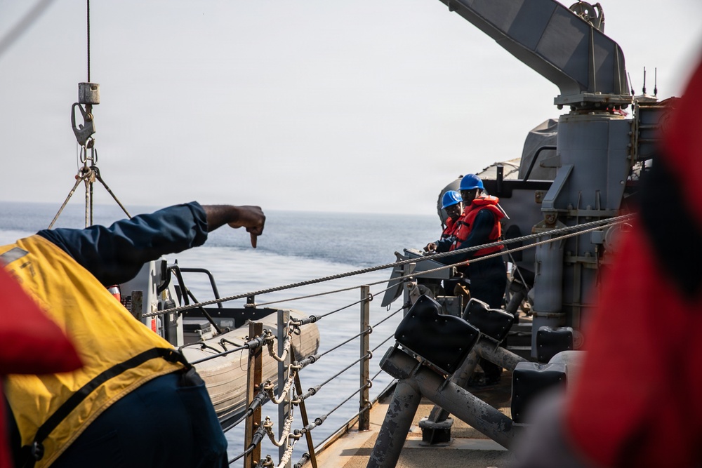 USS Mitscher (DDG 57) conducts small boat operations