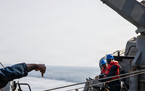 USS Mitscher (DDG 57) conducts small boat operations