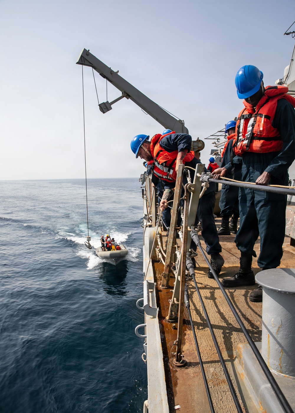 USS Mitscher (DDG 57) conducts small boat operations
