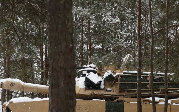 U.S. Army Tank Maintains Security Posture in the Woods During Combined Resolve 26-05 in Hohenfels, Germany
