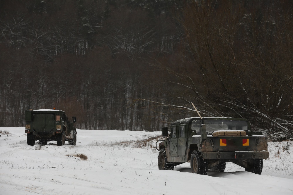 U.S. Army Tactical Vehicles Maneuver to a New Position During Combined Resolve 26-05 in Hohenfels, Germany