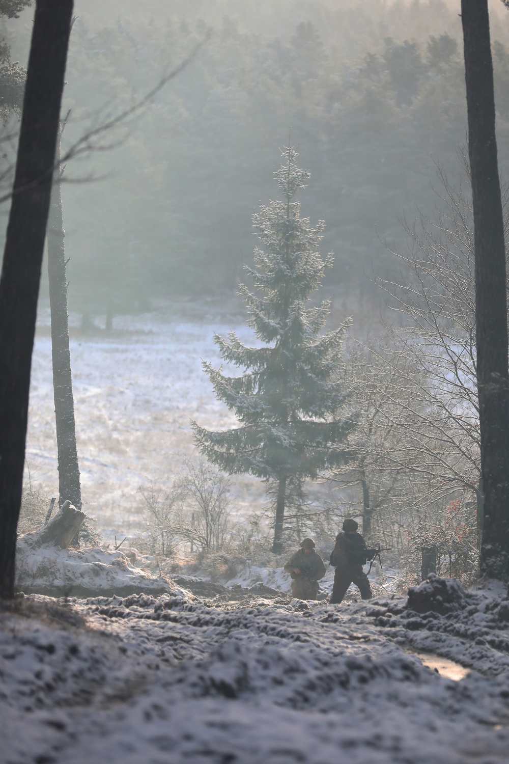 U.S. Army Soldiers Maneuver to a New Position While Making Contact with the Enemy During Combined Resolve 26-05 in Hohenfels, Germany