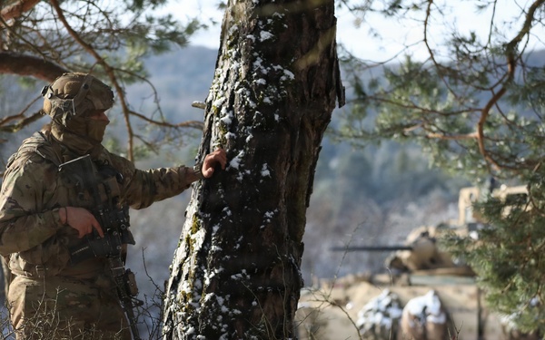U.S. Army Soldier Watches For Enemy Movement During Combined Resolve 26-05 in Hohenfels, Germany
