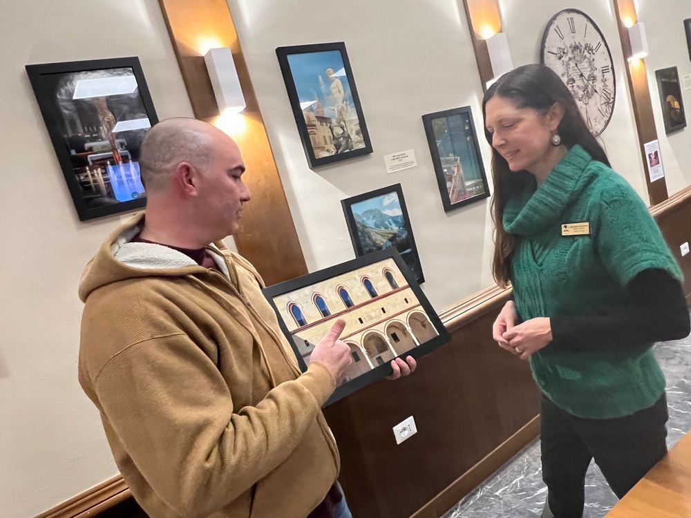 “Artist of the Month” is back with a photo exhibit at new location