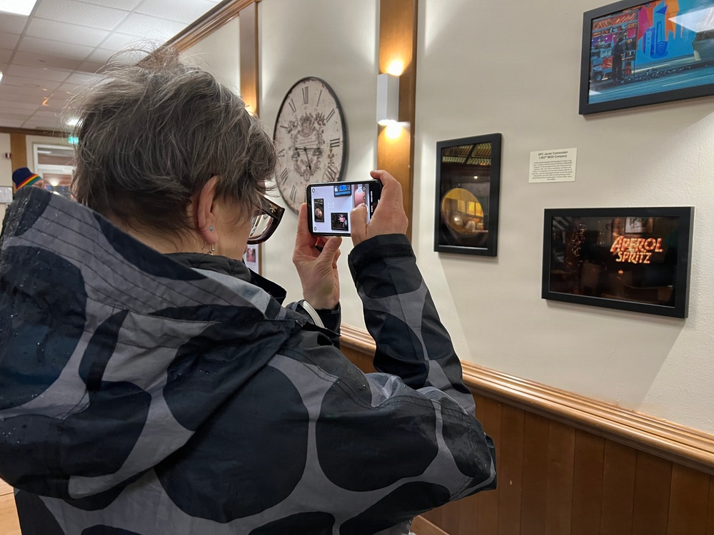 “Artist of the Month” is back with a photo exhibit at new location