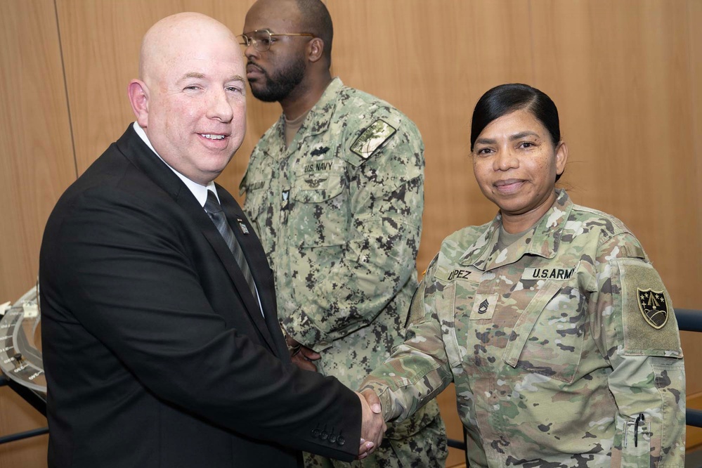 SECWAR SEA Attends Meeting with USSPACECOM Commander, Coins USSPACECOM Members