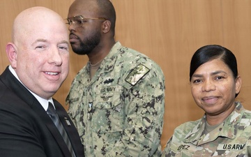 SECWAR SEA Attends Meeting with USSPACECOM Commander, Coins USSPACECOM Members