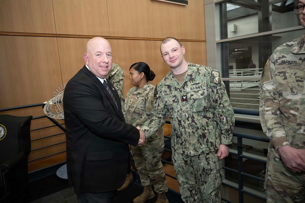 SECWAR SEA Attends Meeting with USSPACECOM Commander, Coins USSPACECOM Members