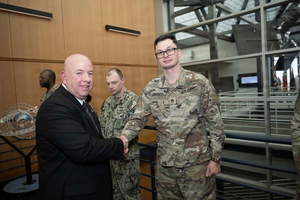 SECWAR SEA Attends Meeting with USSPACECOM Commander, Coins USSPACECOM Members