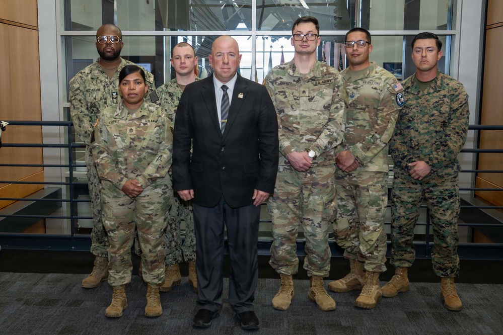 SECWAR SEA Attends Meeting with USSPACECOM Commander, Coins USSPACECOM Members