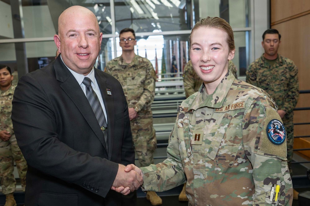 SECWAR SEA Attends Meeting with USSPACECOM Commander, Coins USSPACECOM Members