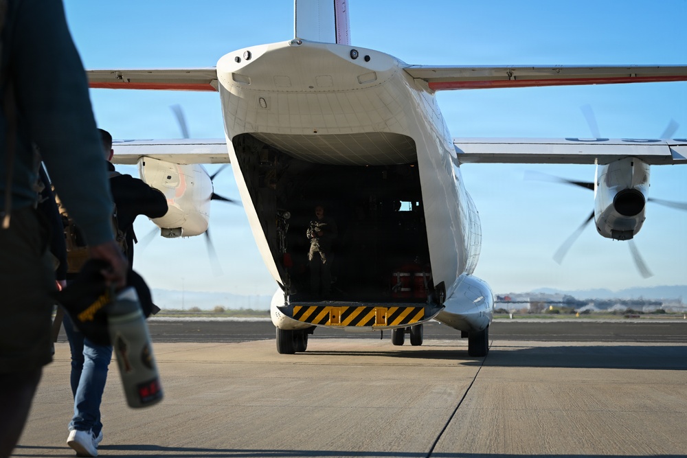 U.S. Coast Guard Port Security Unit members travel to a DHS border security press conference in Arizona