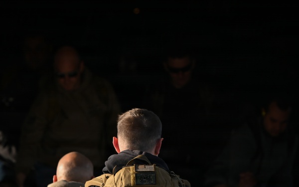 U.S. Coast Guard Port Security Unit members travel to a DHS border security press conference in Arizona