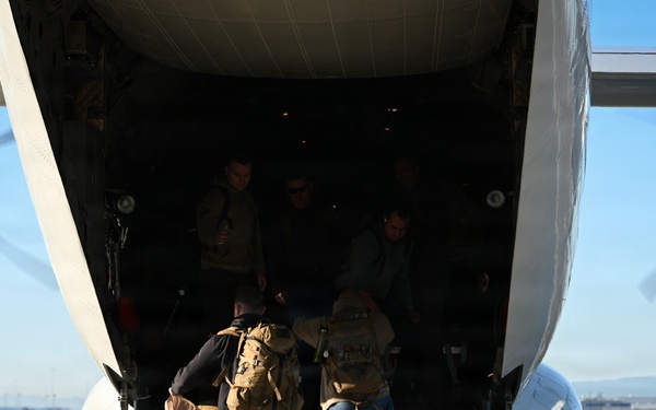 U.S. Coast Guard Port Security Unit members travel to a DHS border security press conference in Arizona