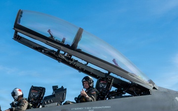 Rear Adm. Richard S. Lofgren, acting Chief of Navy Reserve, flies with Fighter Squadron Composite Twelve (VFC-12)