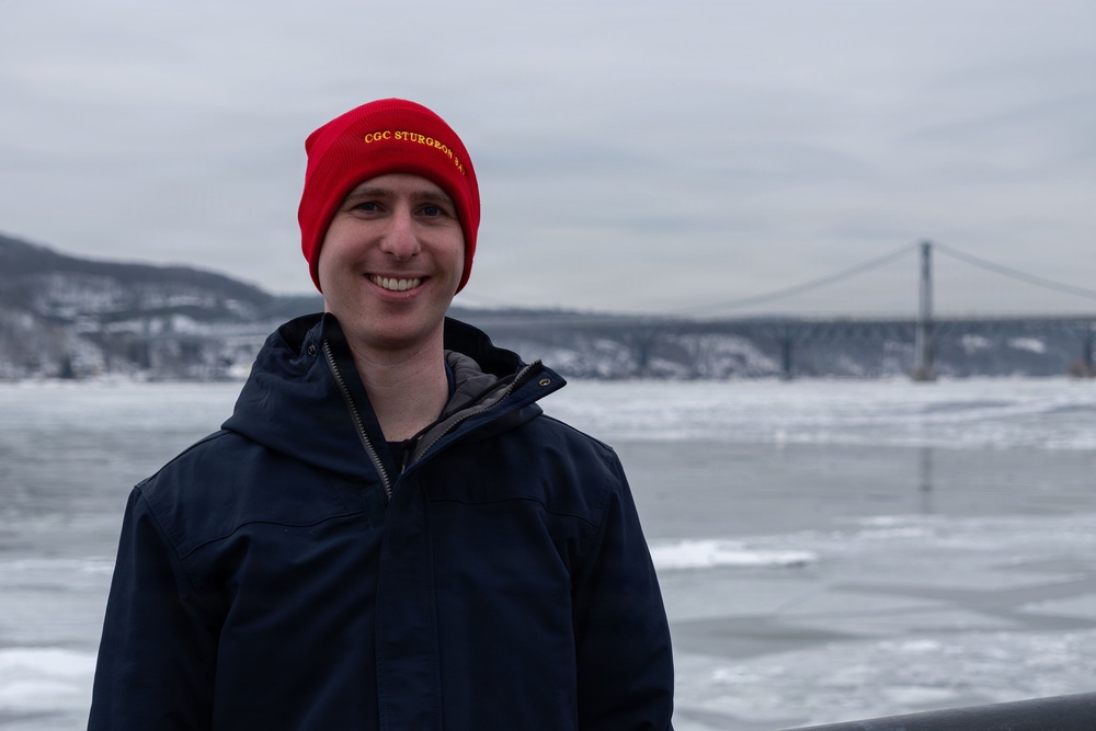 CGC Sturgeon Bay crew member poses for portrait following icebreaking operations