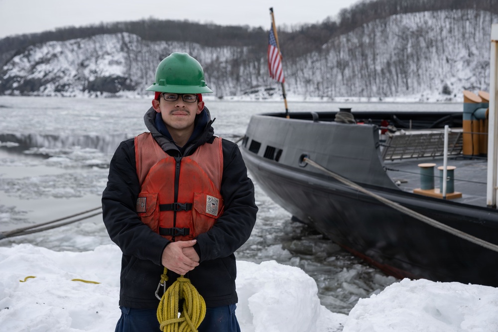 CGC Sturgeon Bay crew member poses for portrait following icebreaking operations
