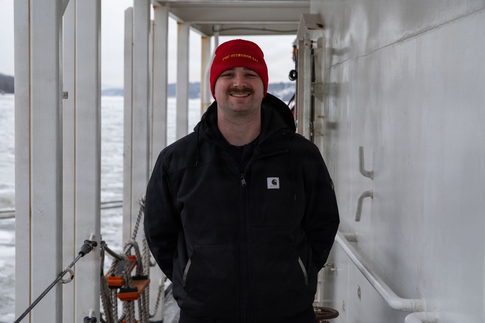 CGC Sturgeon Bay crew member poses for portrait following icebreaking operations