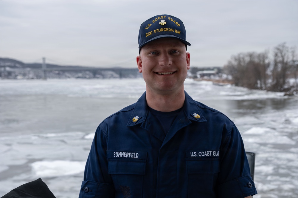 CGC Sturgeon Bay crew member poses for portrait following icebreaking operations