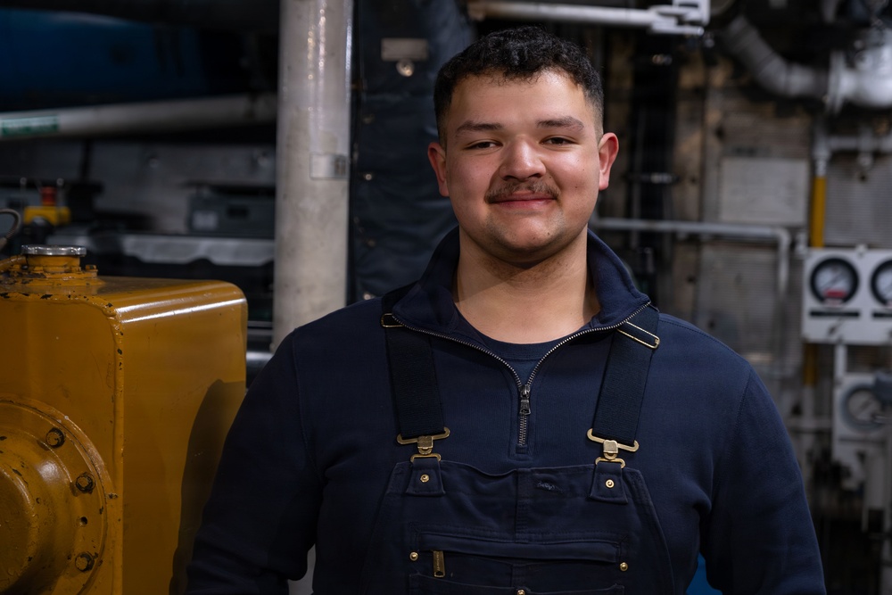 CGC Sturgeon Bay crew member poses for portrait following icebreaking operations