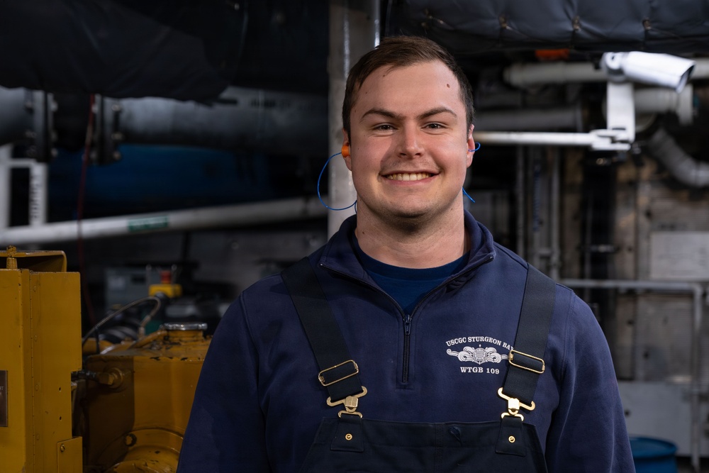 CGC Sturgeon Bay crew member poses for portrait following icebreaking operations