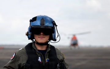 Coast Guard Pilot Prepares for Training Flight in Houston