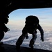 Green Beret exits CH-47 Chinook helicopter during a military free fall jump
