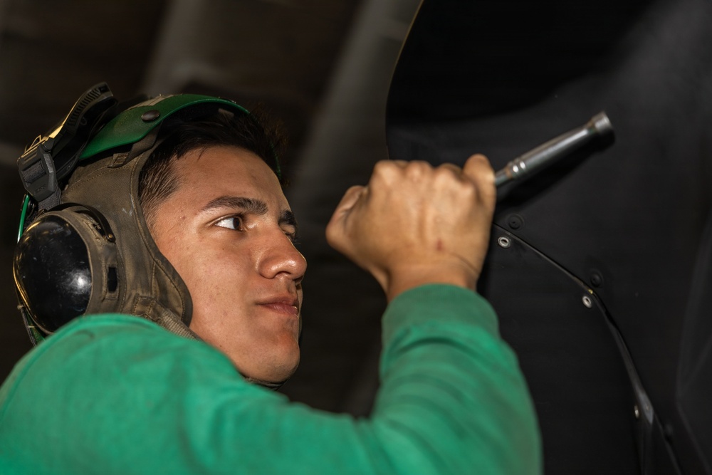 MH-60S Maintenance in USS Iwo Jima's Hangar Bay