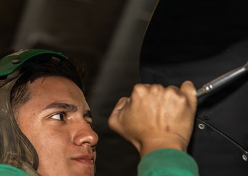 MH-60S Maintenance in USS Iwo Jima's Hangar Bay