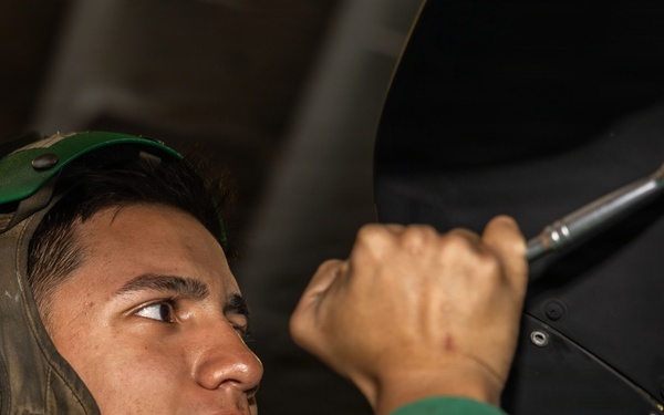 MH-60S Maintenance in USS Iwo Jima's Hangar Bay