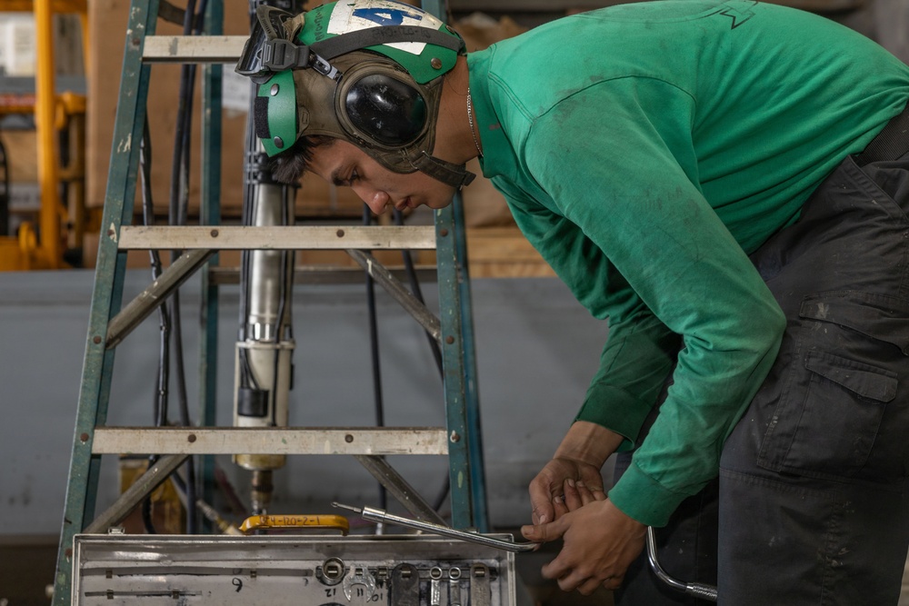 MH-60S Maintenance in USS Iwo Jima's Hangar Bay