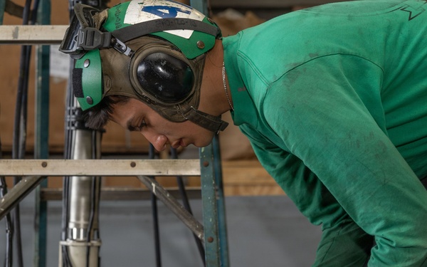 MH-60S Maintenance in USS Iwo Jima's Hangar Bay