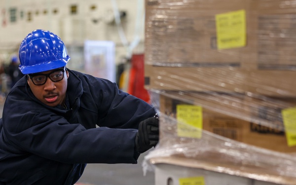 PCU John F. Kennedy Conducts Stores Onload