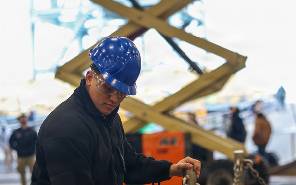 PCU John F. Kennedy Conducts Stores Onload