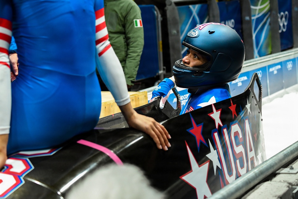 Spc. Azaria Hill competes in the 2-woman bobsled in the 2026 Winter Olympics