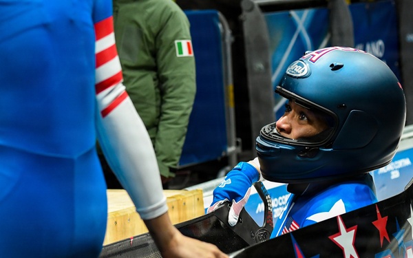 Spc. Azaria Hill competes in the 2-woman bobsled in the 2026 Winter Olympics