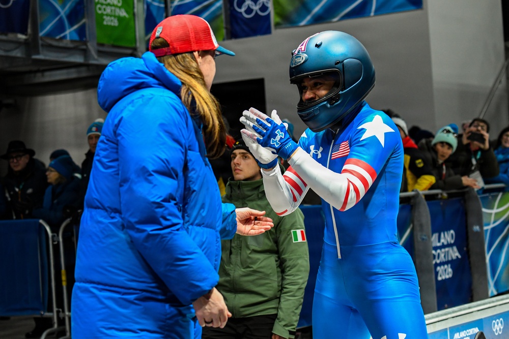 Spc. Azaria Hill competes in the 2-woman bobsled in the 2026 Winter Olympics