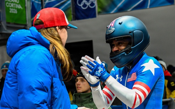 Spc. Azaria Hill competes in the 2-woman bobsled in the 2026 Winter Olympics