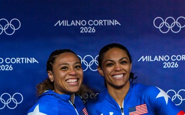 Spc. Azaria Hill competes in the 2-woman bobsled in the 2026 Winter Olympics