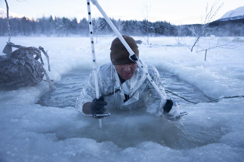 CORE26 | U.S. Marines Participate in Polar Plunge during Cold Weather Survival Training