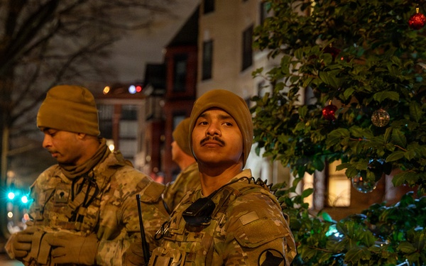 Arkansas Guard members prepare for nighttime patrol of DC Safe and Beautiful mission