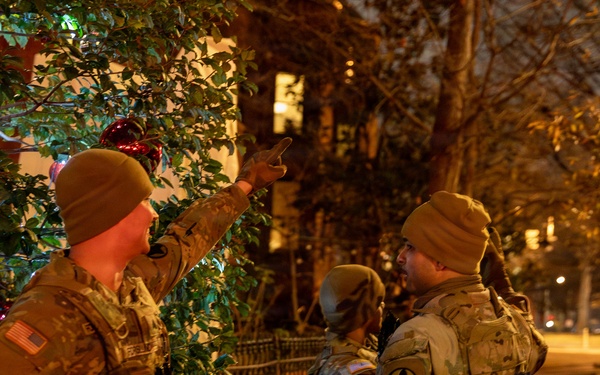 Arkansas Guardsmen prepare for nighttime patrol of DC Safe and Beautiful mission