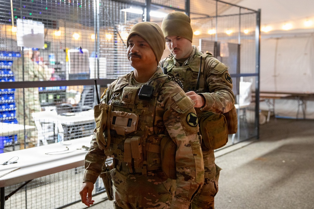Arkansas Guardsman prepare for nighttime patrol of DC Safe and Beautiful mission