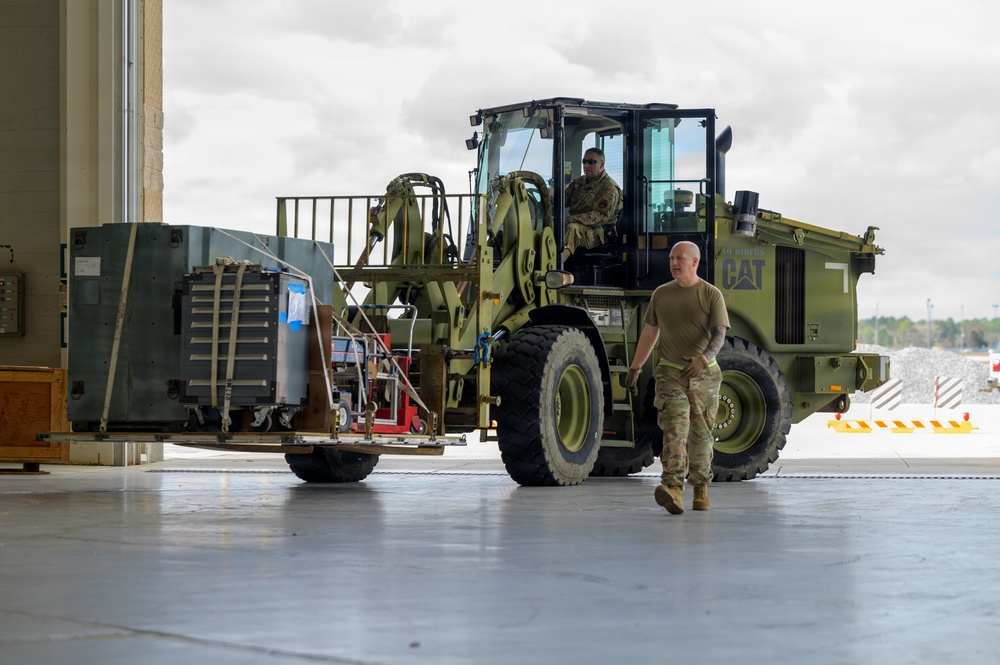174th Attack Wing weapons specialists move equipment during Sentry South 26-2