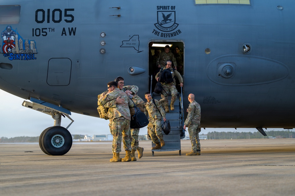 156th Airlift Wing Airmen depart C-17 during Sentry South 26-2