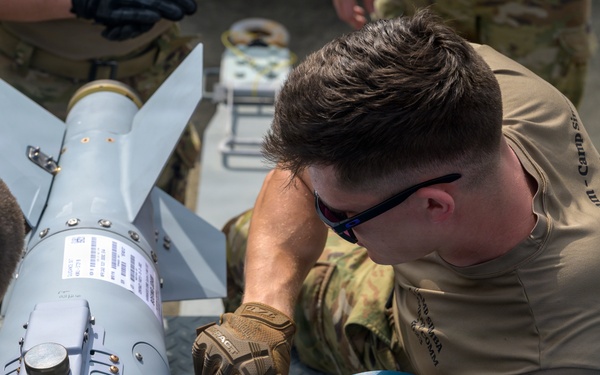 137th SOW Airman secures GBU-38 tailfin during Sentry South 26-2
