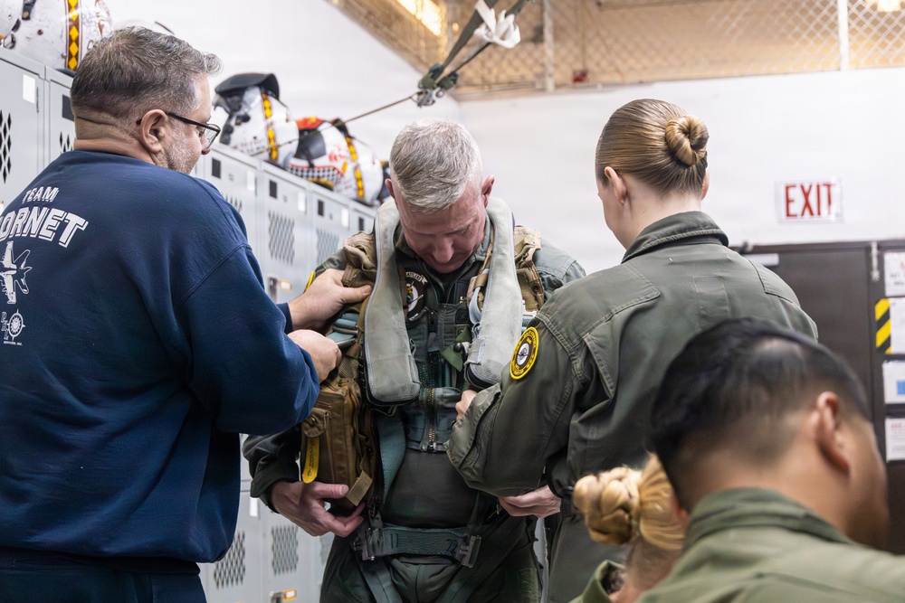The Commandant, Gen. Eric M. Smith flies a F/A 18 at Marine Fighter Squadron 323